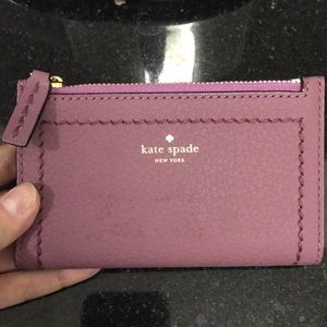 Kate Spade!wallet with light markings on the front